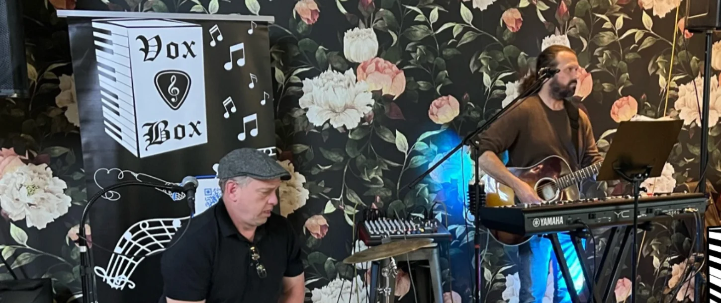 Kenny Isaacs and James Richard performing together as Vox & Box Duo